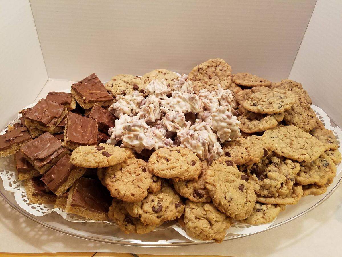 Cindy Unzicker's Bite Me Cookies business offers huge 6-inch cookies for about $3 each. Customers may also order platters that can be customized with their choice of cookies and other desserts such as pecan delights, peppermint chips, chocolate peanut butter balls and more.
