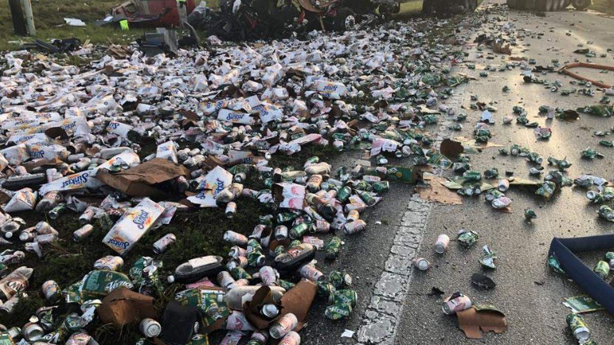 A semi truck crashed and spilled thousands of cans of soda it was carrying across the roadway and shoulder of County Road 74 in Charlotte County Tuesday morning. Two other semis were involved in the fatal crash.