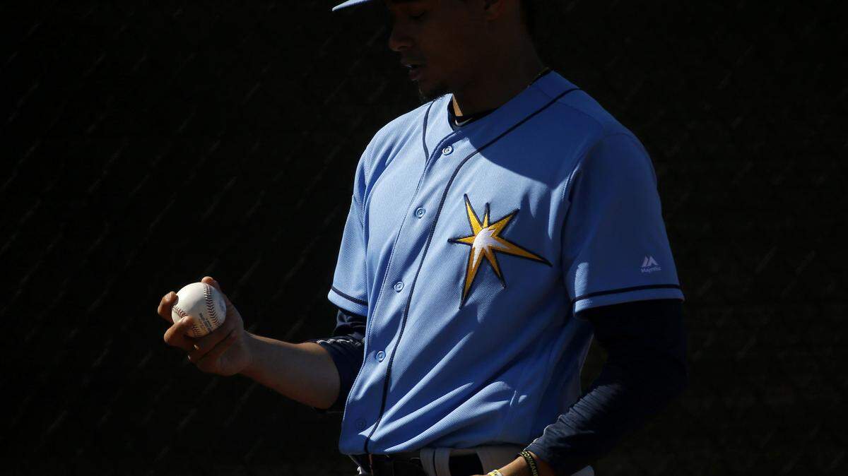 Tampa Bay Rays pitcher Chris Archer prepares to throw a pitch during a spring training baseball workout in Port Charlotte, Fla., Friday, Feb. 26, 2016. (AP Photo/Patrick Semansky)