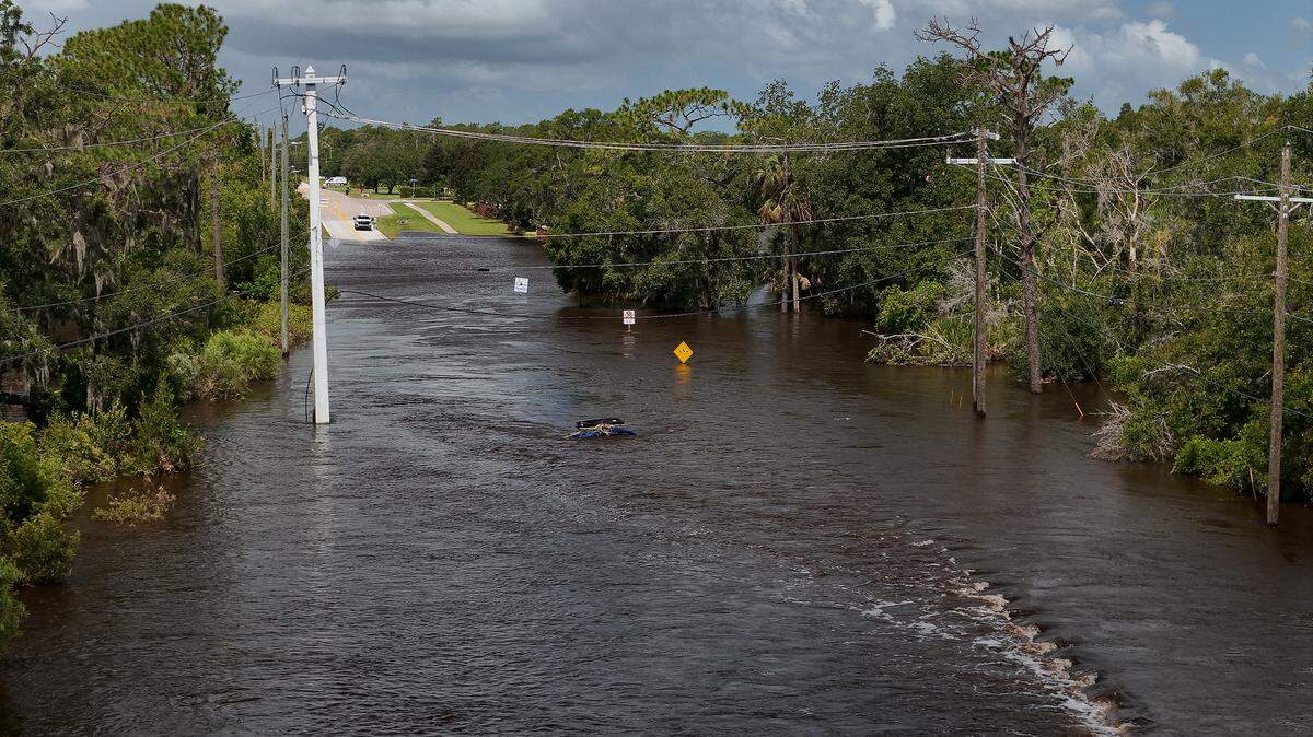 8/4/2024--Portions of Upper Manatee River Road flooded after Hurricane Debby. 