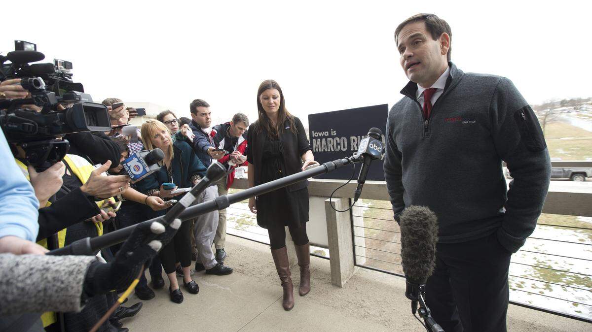 Republican presidential candidate, Sen. Marco Rubio, speaks to reporters before a campaign event at Iowa State University, Saturday in Ames, Iowa. (AP Photo/Mary Altaffer)