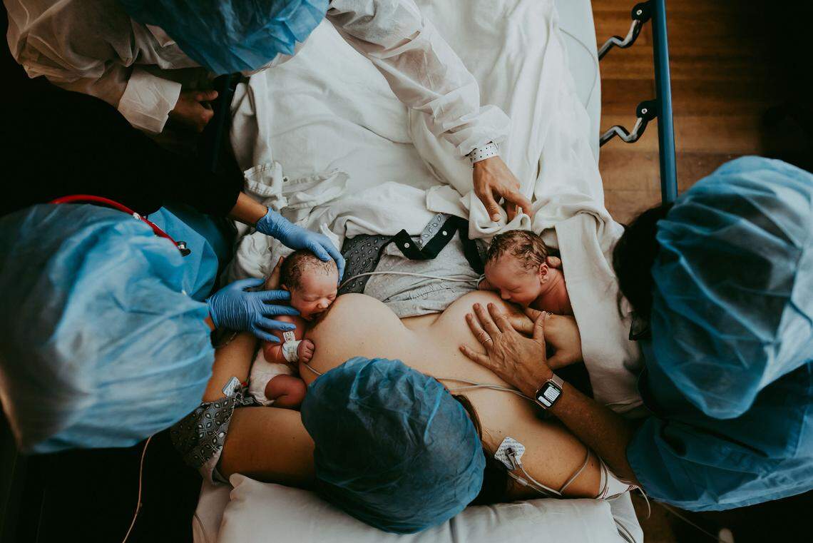Bradenton photographer and former labor and delivery nurse Jessica Miles won best overall postpartum photo in The International Association of Professional Birth Photographers 12th annual competition for this photo of a mom breastfeeding her twins.