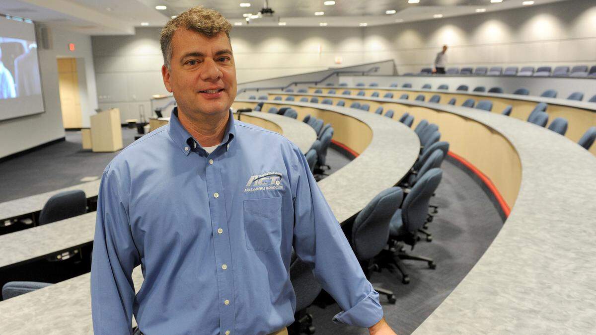 In this file photo, Doug Wagner stands in an auditorium that now bears his name at Manatee Technical Institute. Wagner is the executive director of adult, career and technical education for Manatee County schools, and he recently assumed the role of interim deputy superintendent.