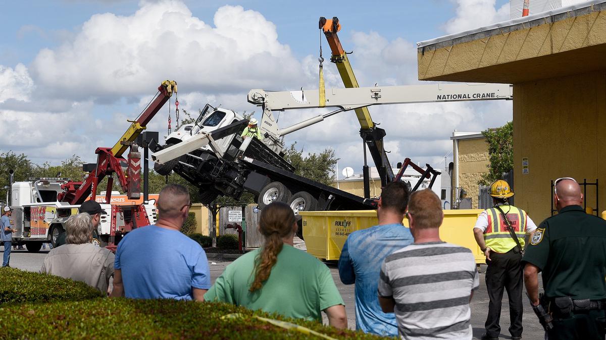 During some roof work on the building housing Crunch near University and Lockwood Ridge Road a crane tipped over, injuring one person. Later in the afternoon, crews were still working to right the vehicle.