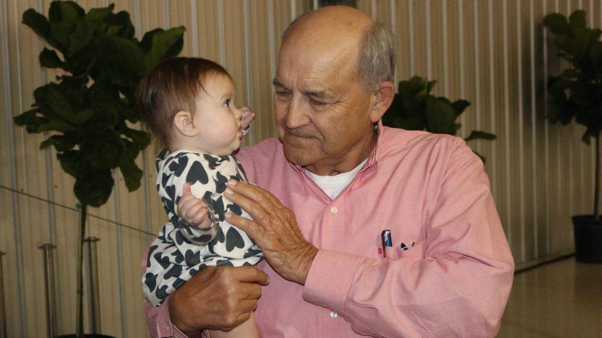 01/6/2022-Buddy Keen received the Manatee County Fair’s Distinguished Citizen Award on Thursday. He is shown after the award presentation with his granddaughter, Palmer, eight months.