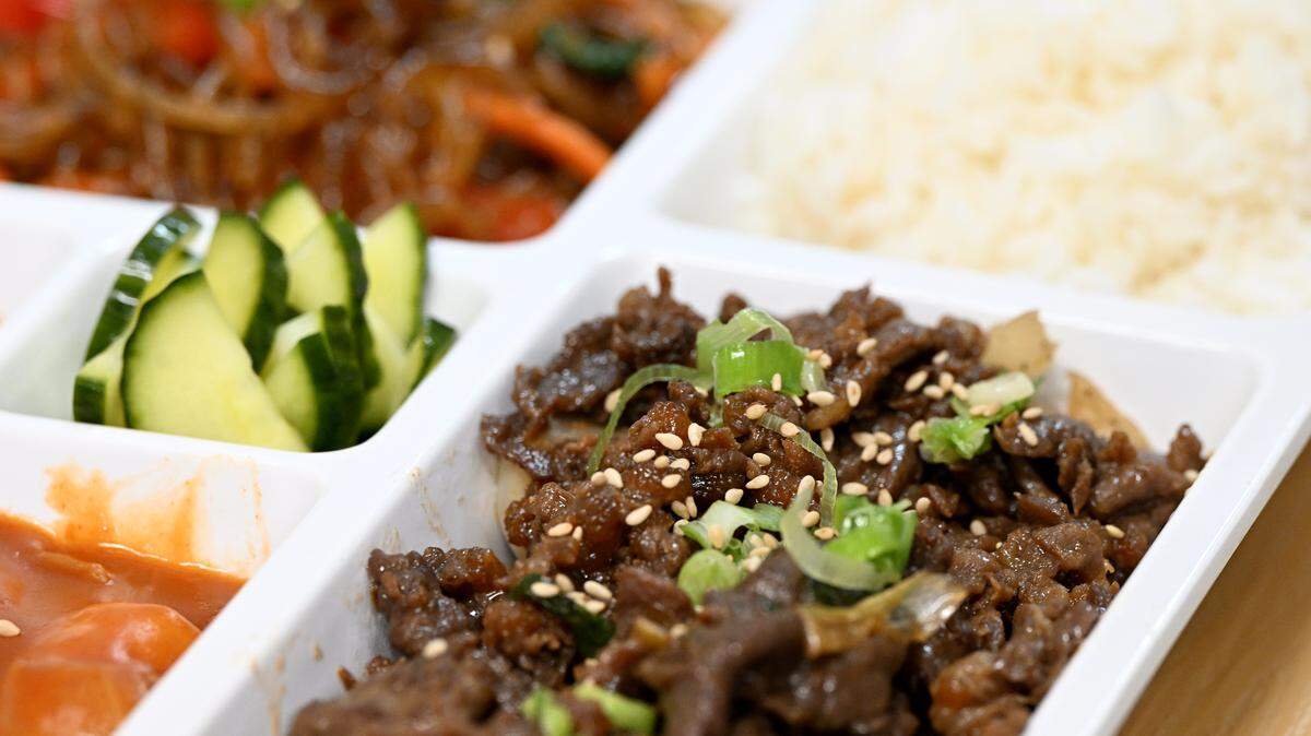 Doshirok meal platter to-go with bulgogi beer, rice, Japchae, Tteok-bokki. Sisters Mary Pierson and Katherine Kim have opened a traditional Korean restaurant with some modern dishes as well at Sunny Seoul Korean Kitchen, 9750 State Road 64, shown here on March 18, 2026.
