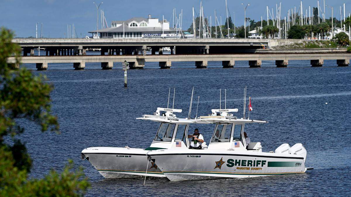 Manatee County Sheriff’s Office divers and and boats were present on Monday, Aug. 26, 2024, at the Palmetto Estuary Nature Preserve, where Manuel Escobar was found shot dead in the trunk of a car early Sunday morning, deputies say.