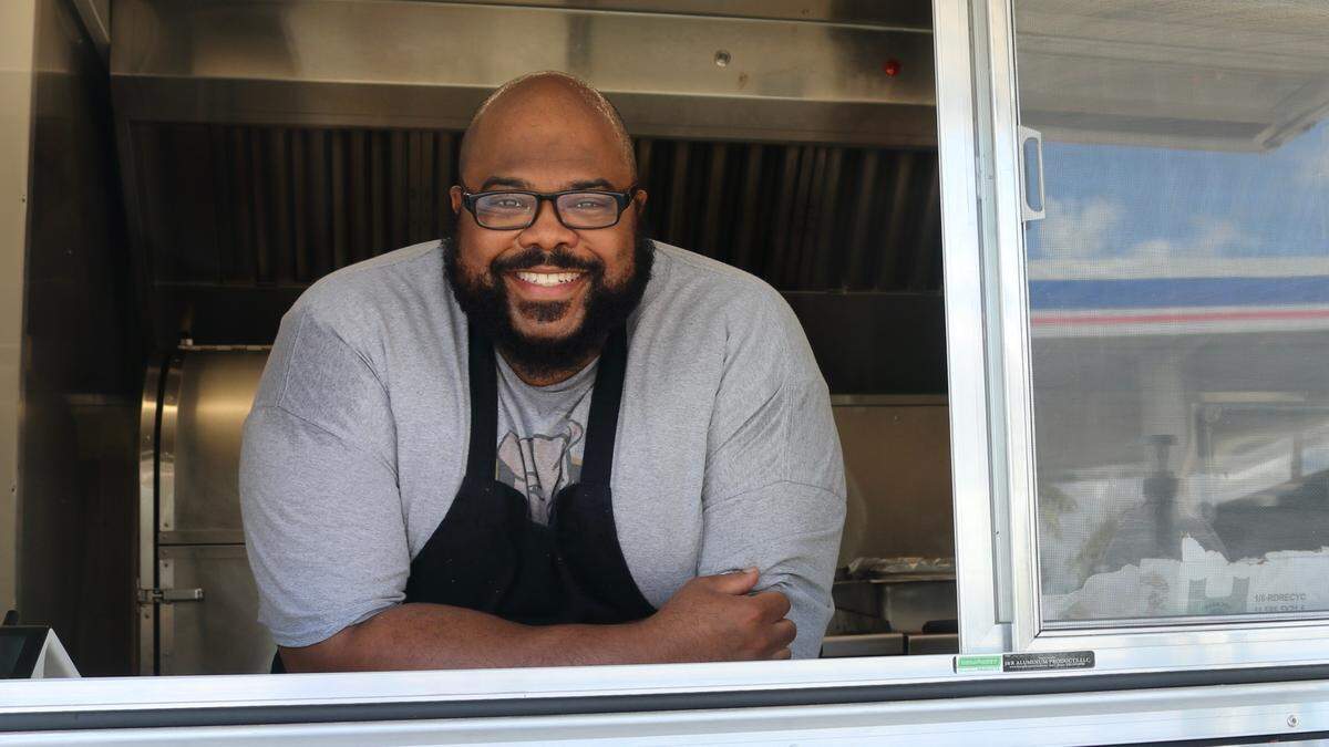 Ty Martin, owner and pit master for Ty’s Golden Hog food truck and catering, shown above May 4, 2022, went into business in Parrish in November and has since taken his barbecue all over Manatee County.