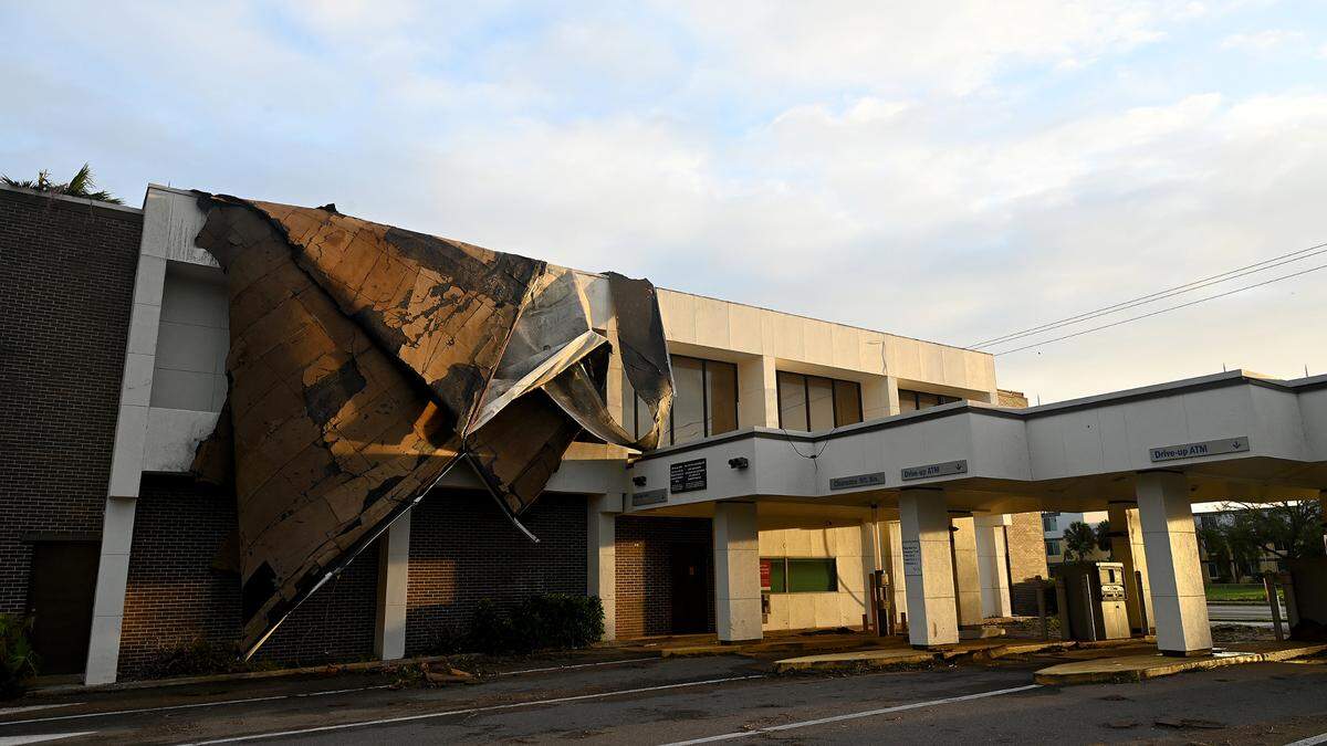 The Bank of America building on 14th Street West and Bayshore Gardens lost its roof during Hurricane Milton on Oct. 10, 2024.