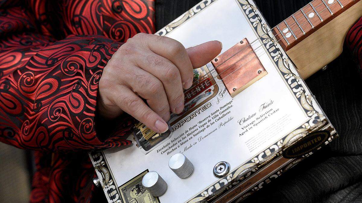Steve Arvey with his cigar box guitar during the Village of the Arts’ Bradenton Cigar Box Guitar Festival in February 2018.