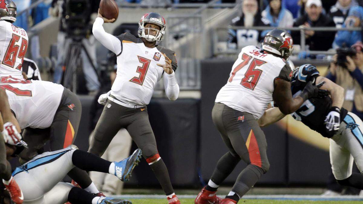 Tampa Bay Buccaneers quarterback Jameis Winston (3) looks to pass against the Carolina Panthers in the first half of an NFL football game in Charlotte, N.C., Sunday, Jan. 3, 2016. (AP Photo/Bob Leverone)