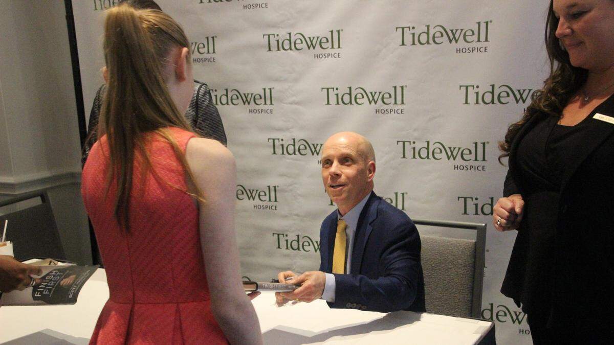 Many lined up to buy an autographed copy of Scott Hamilton’s book “Finish First” Friday at The Ritz-Carlton Sarasota. Hamilton was in town to address the 10th Annual Tidewell Hospice Signature Luncheon.