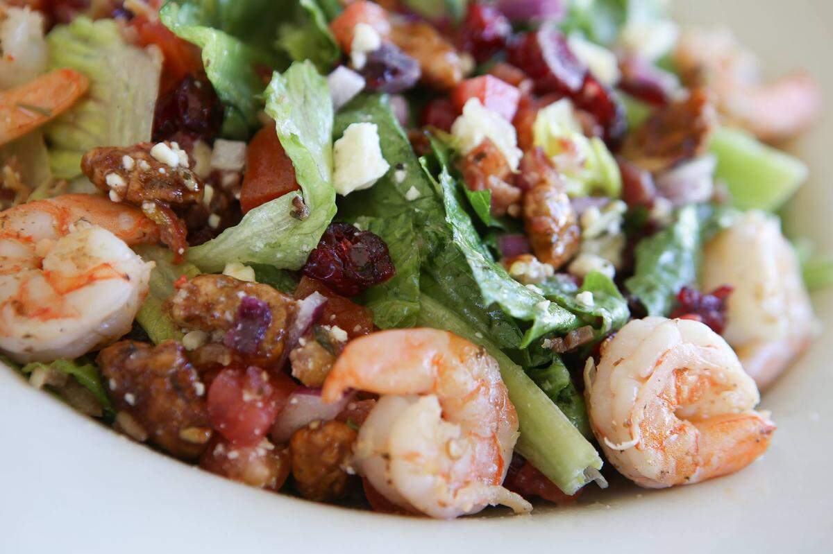 The “Siesta Salad” at Gecko’s Grill & Pub comes with romaine lettuce, feta cheese, cranberries, glazed pecans, tomato, bacon and onion tossed in a Greek vinaigrette. It can be upgraded with chicken, tilapia or shrimp.
