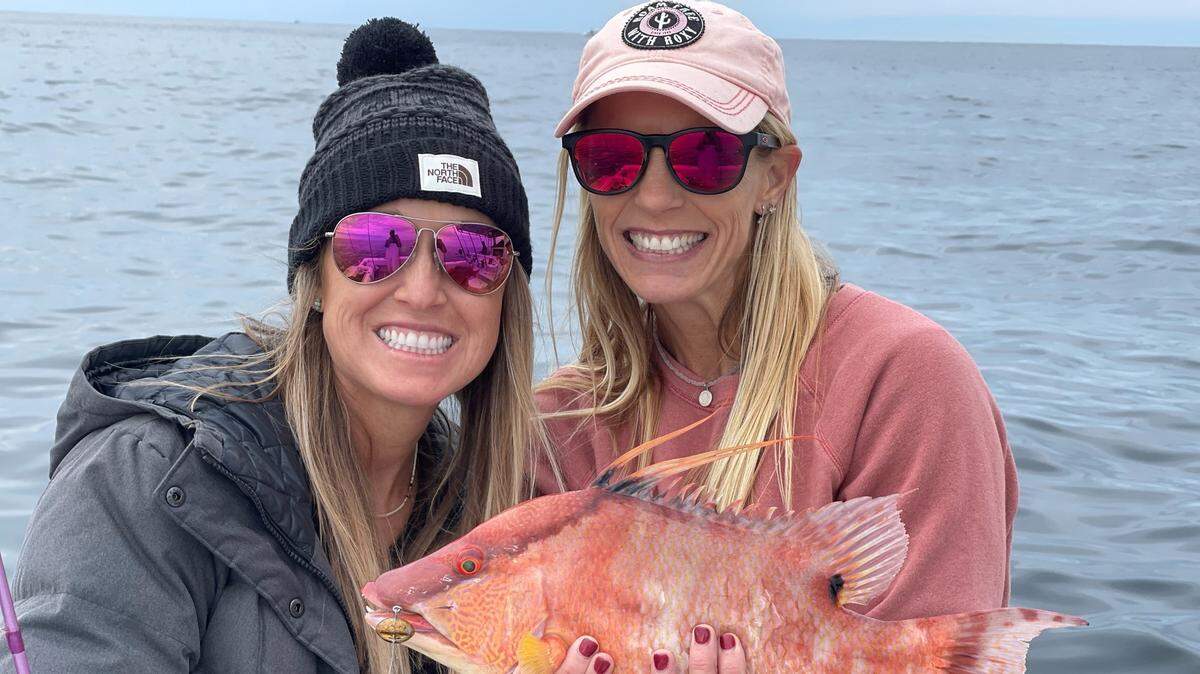 Stephanie Travis, left, and Wendy Jordan with a hogfish caught in 50-feet of water off Anna Maria Island.