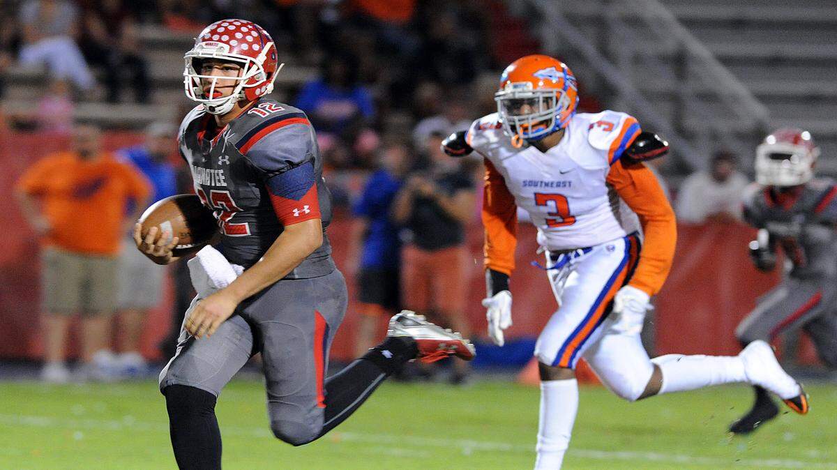 Manatee's AJ Colagiovanni runs the ball for a touchdown against Southeast in the big rivalry game Friday night.TIFFANY TOMPKINS-CONDIE/Bradenton Herald