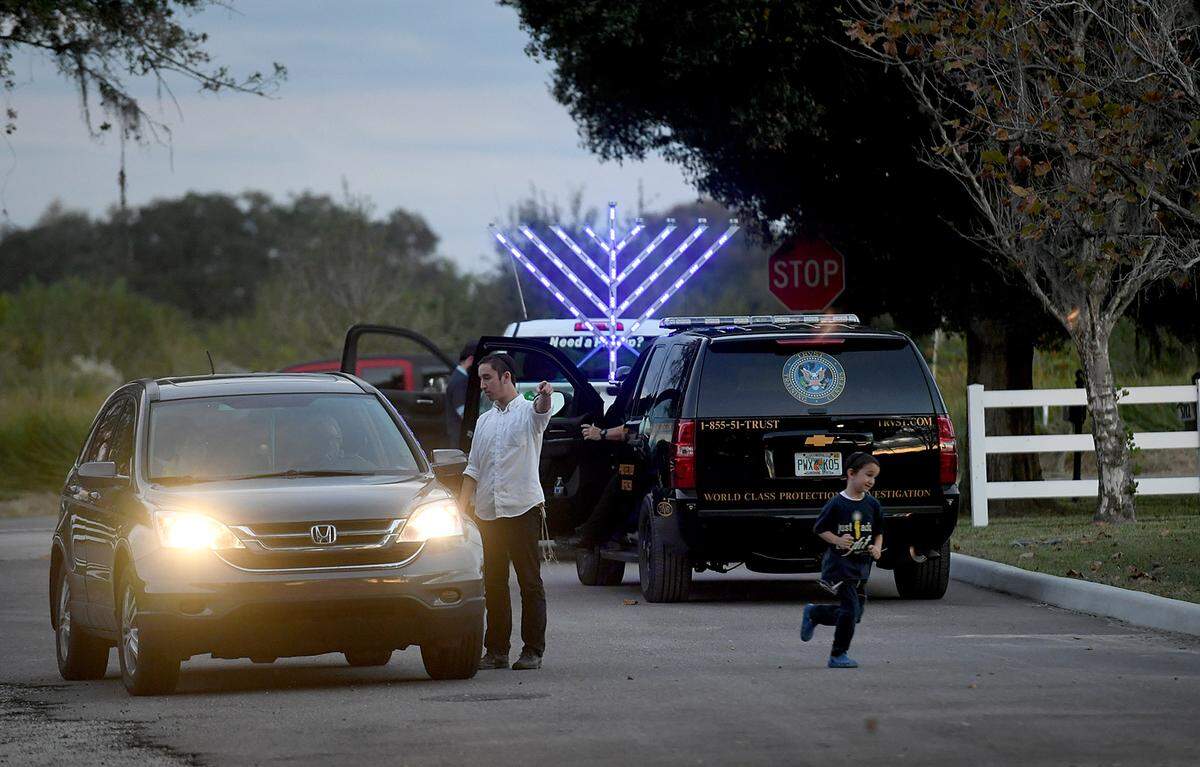 12/01/21—Members of the Chabad of Bradenton prepare to begin the celebration of the 4th night of Hanukkah with a small parade of menorahs, singing, prayers and special foods.