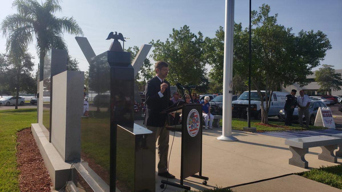 Retired Army Col. William Michael Thurmond addresses those gathered at the annual Memorial Day service at Veteran’s Monument Park in Bradenton.
