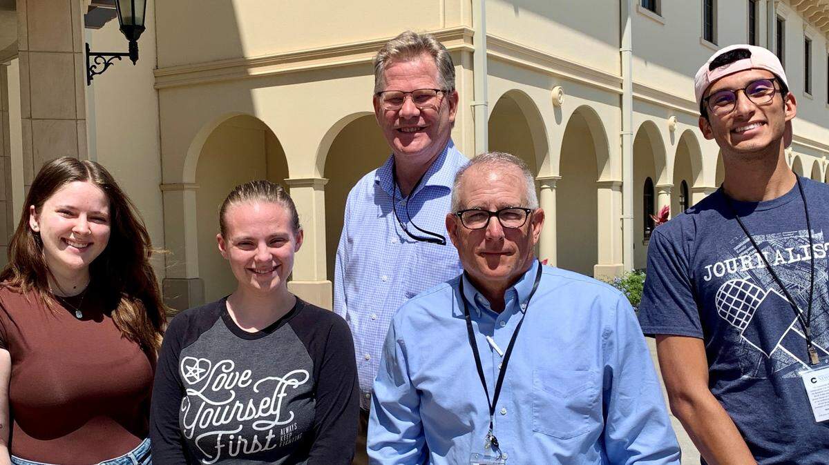 The Community News Collaborative team consists of reporters Sarah Owens, left, Catherine Hicks, Jim DeLa and Alejandro Romero. Editor Eric Garwood, center, oversees the team.