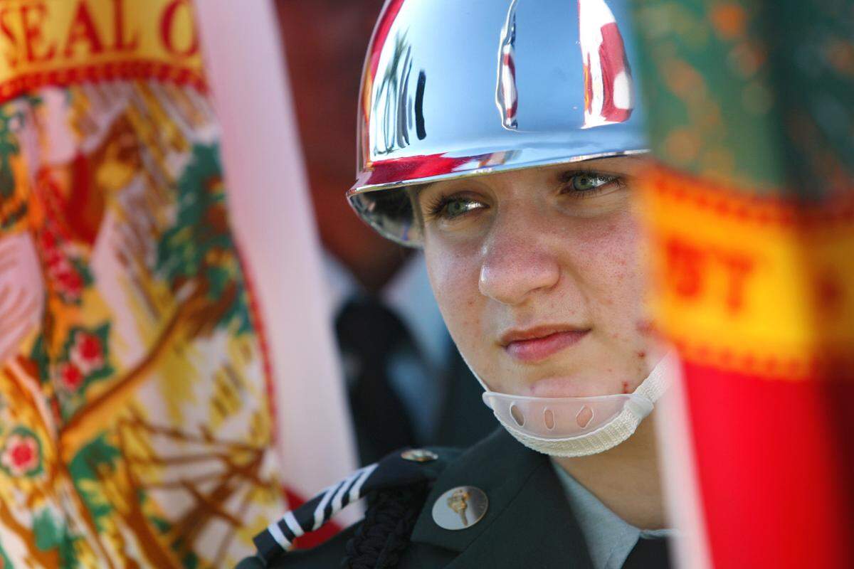 Sarah Riffel of Lakewood Ranch High’s JROTC stands with the honor guard at the Memorial Day 2010 program at the Veteran’s Memorial on the Manatee River.
