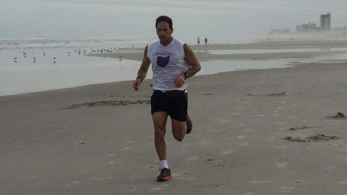 Steve Schwalbach is running across the state of Florida to raise money to fight Alzheimer's disease which claimed his mother, Jackie, a year ago. Schwalbach's run, which started in Daytona Beach on March 11, is scheduled to end at Sarasota's Lido Beach at about 3 p.m. Friday. 
 PROVIDED PHOTO