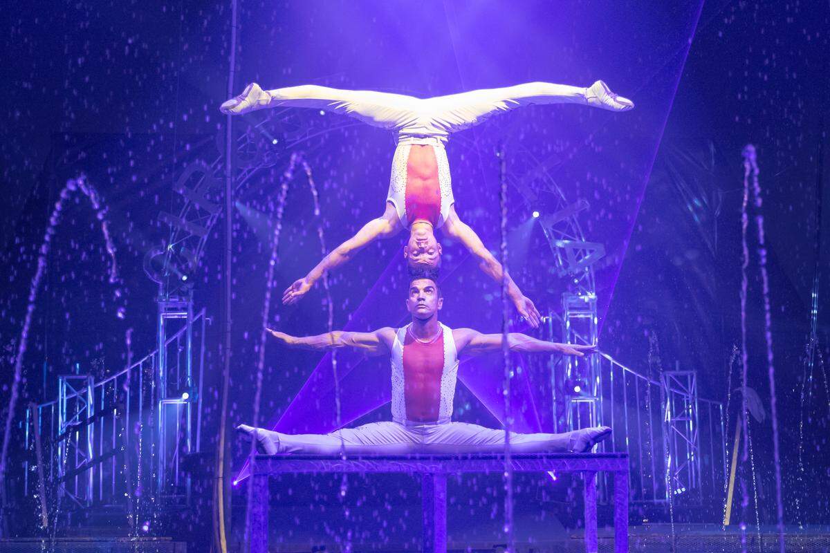 Performers take part in a hand-to-hand balancing act in Cirque Italia’s Water Circus. The show is in Palmetto this weekend.