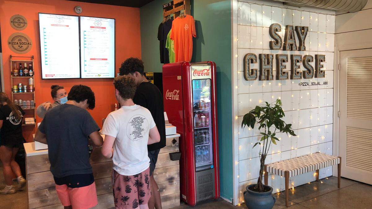 3/24/2021--Andrew and Ammanda ​ Simonetti opened Pizza Social last June at 308 Pine Ave., Anna Maria. The pizzeria has been popular with locals and visitors alike.