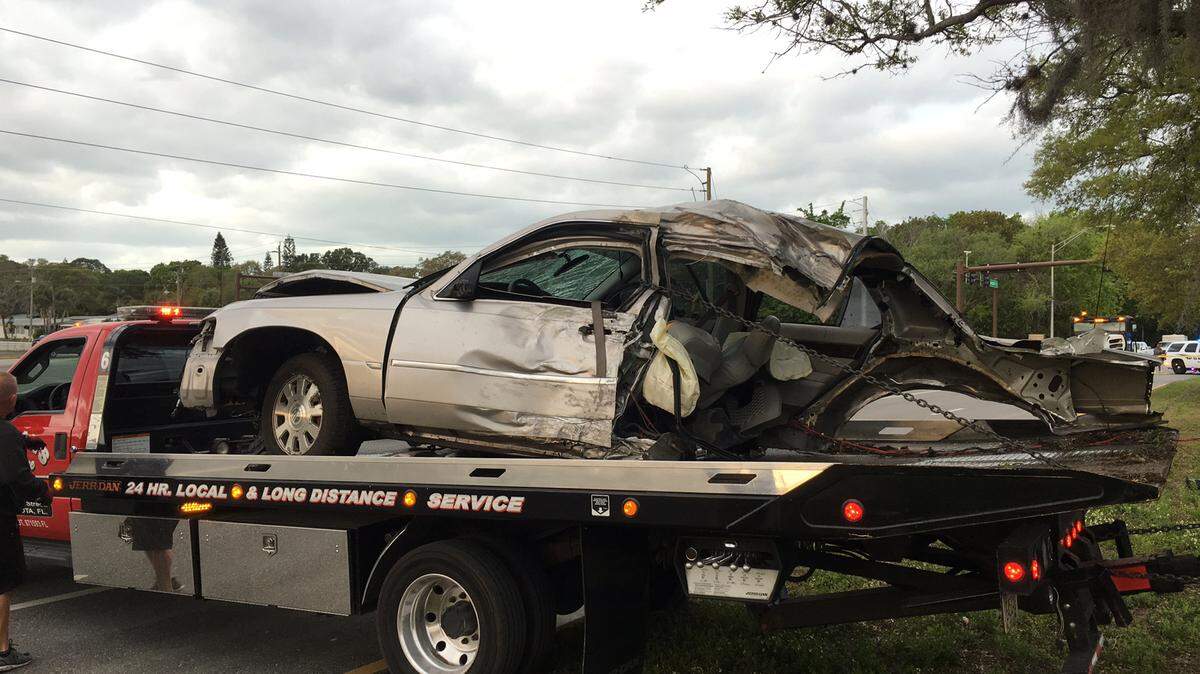 Sarasota police say they don't know yet if a crash that killed three men and injured another was alcohol related. The vehicle hit a curb at a high rate of speed and crashed into a few trees, splitting it in half. Provided photo
