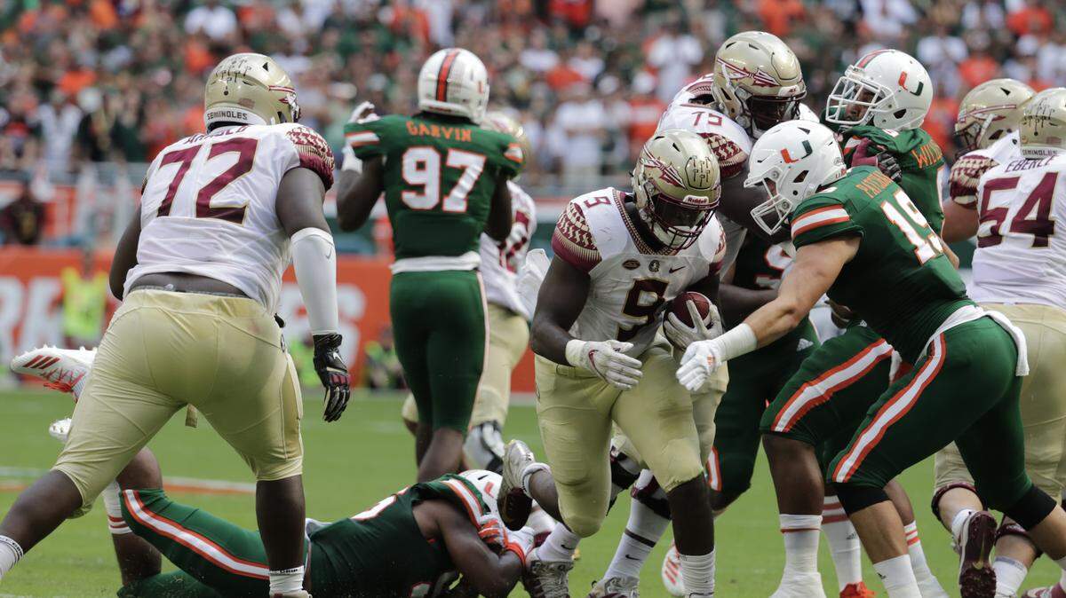 Florida State running back Jacques Patrick (9) runs during the first half of an NCAA college football game against Miami, Saturday, Oct. 6, 2018, in Miami Gardens, Fla.
