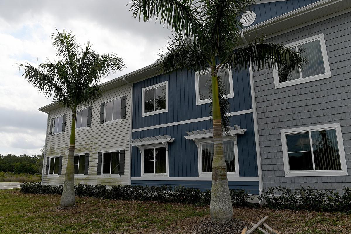 Two years after it was expected to open, the Comfort Cove Senior Care facility sits silent and empty on 14th Street in Bradenton.