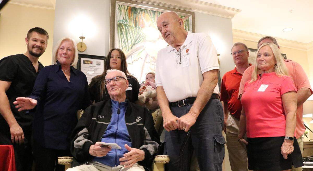 Friends and family members gathered on Wednesday as Gene Christie introduced his CD, “Thirty Days Later,” commemorating American lives lost during the battle for Iwo Jima.