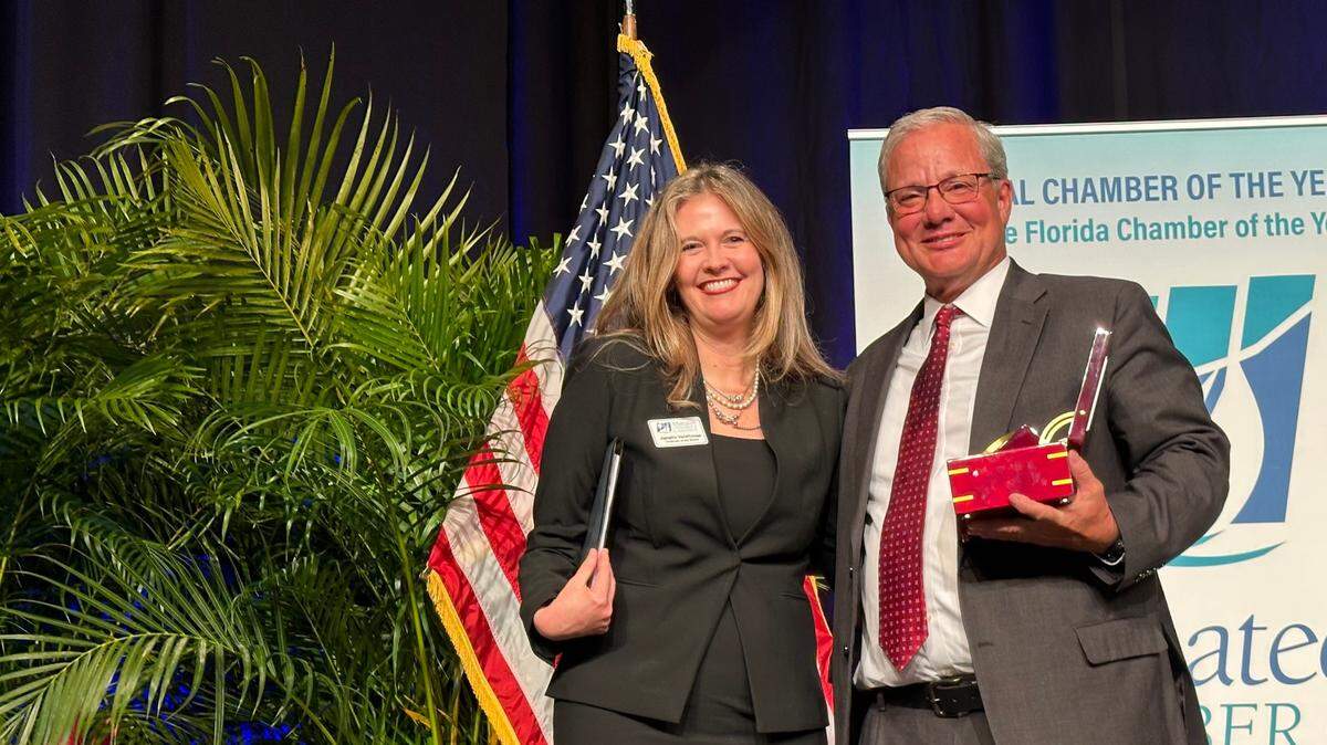 John Vita, recipient of the Manatee Chamber of Commerce’s seventh-annual Robert P. Bartz Award for Outstanding Leadership, is shown 2/15/2024 with chamber board chair Janelle (Esposito) VanHoose.