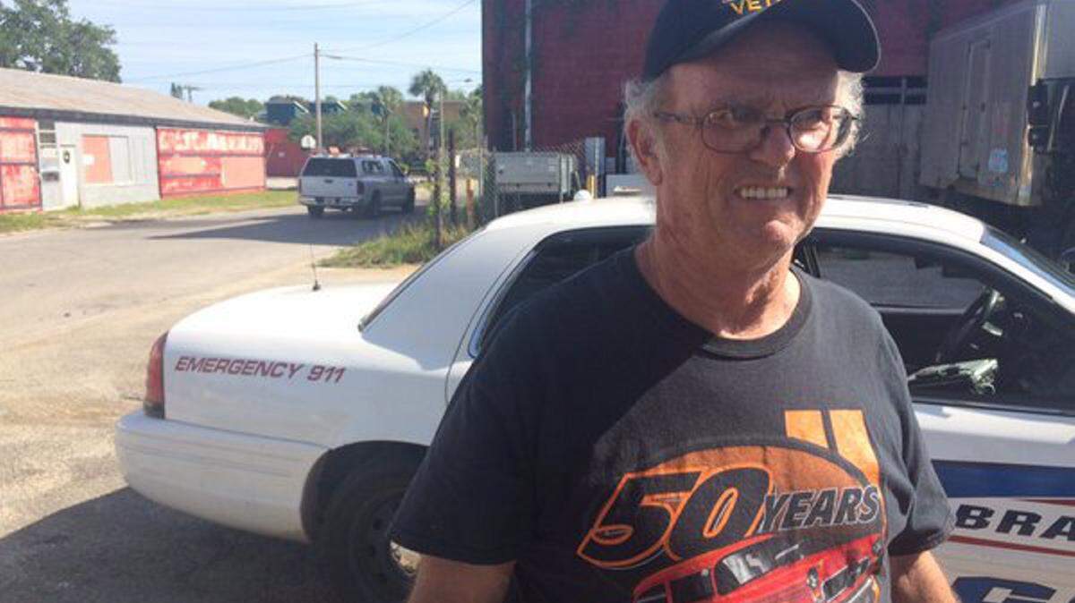 James Feehan, 67, stands near the scene of a crash Friday evening.AMARIS CASTILLO/Bradenton Herald