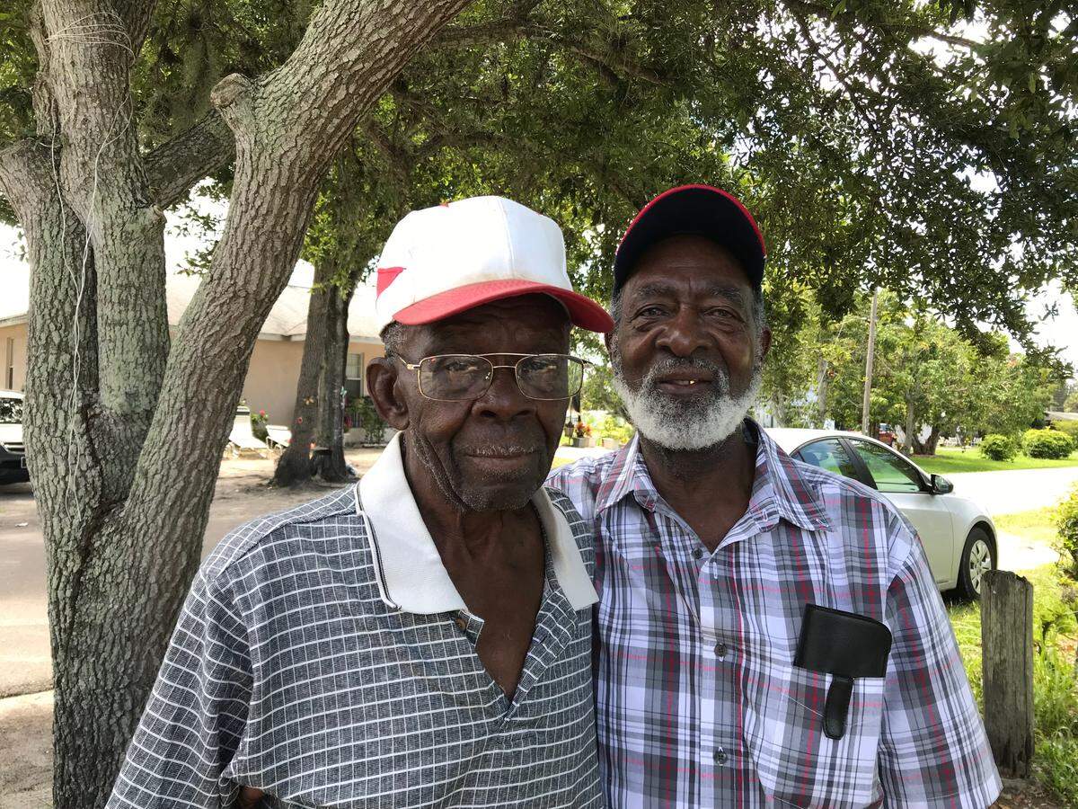Eddie Bostic, 90, left, and Randolph Hodo, 77, said they are happy that the Rubonia Cemetery finally has a flagpole.