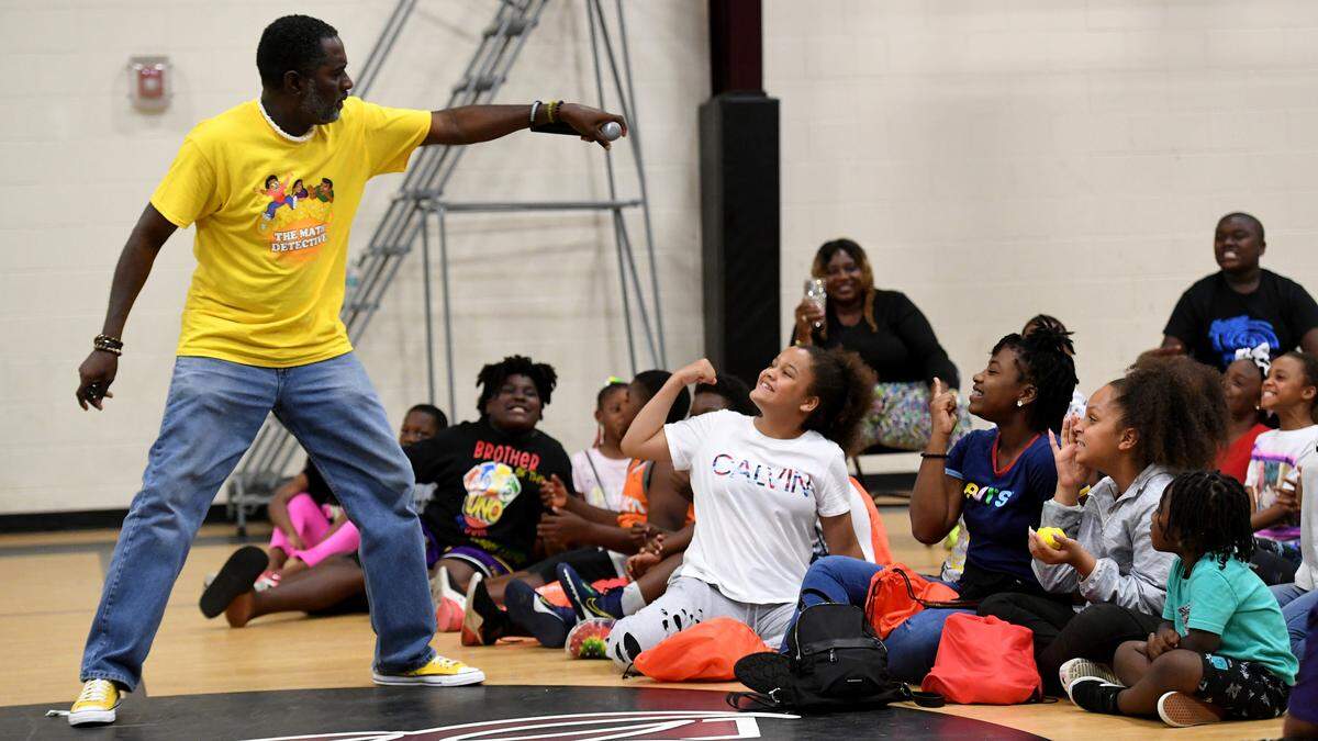 Author Vincent Taylor makes reading fun with children at the 13th Ave Center through music and audience participation. The Rosalyn Walton Education and Enrichment Services, Inc along with the 13th Avenue Dream Center is hosting the 6th Annual Juneteenth Reading Conference and Community Festival Friday and Saturday.
