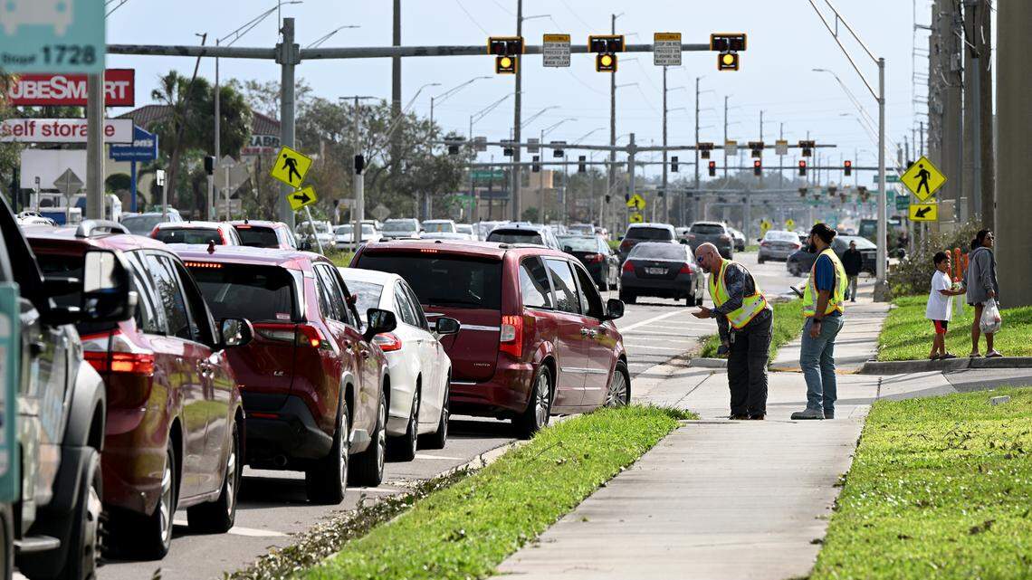 A line of cars formed down the road for the Wawa at 2409 Cortez Road West in Manatee County, Friday, Oct. 11, 2024. Only two pumps seemed to be in use as deputies from the Manatee County Sheriff’s Office tried to keep motorists in line.