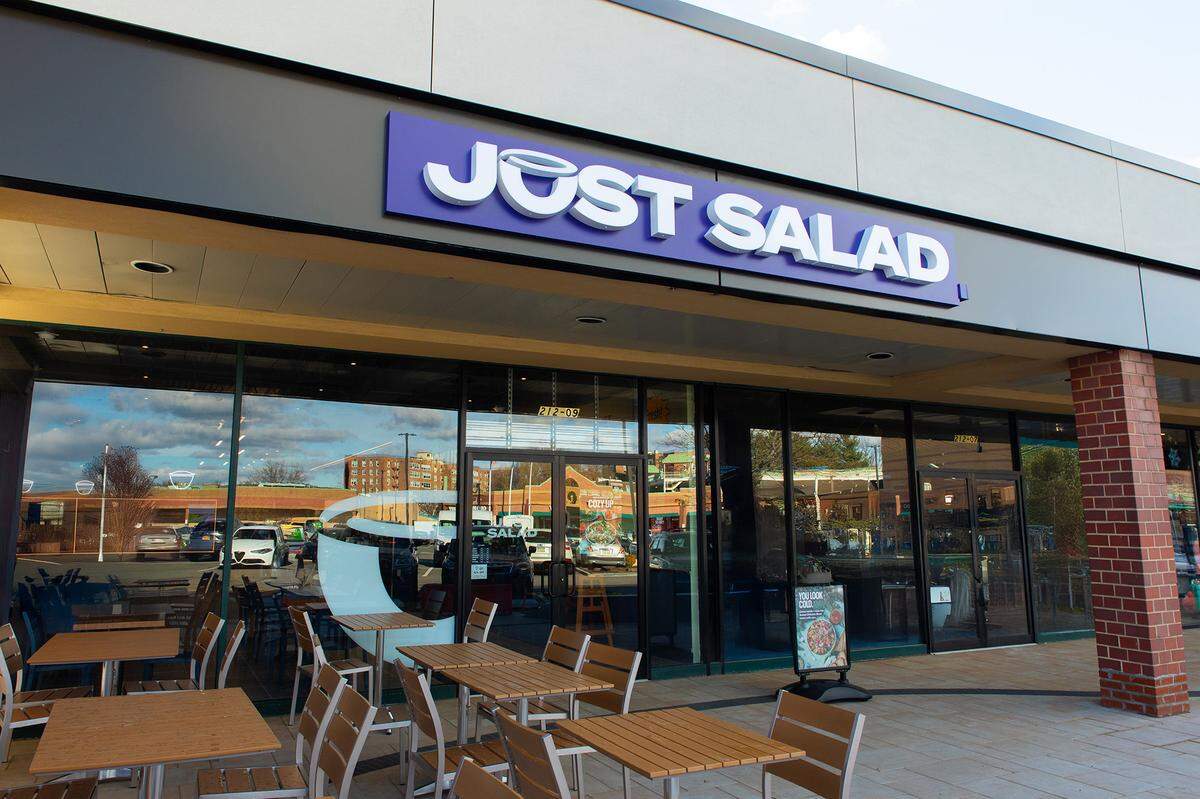 The fast-casual chain Just Salad offers healthy, affordable, climate-conscious meals with salads, smoothies, bowls, wraps and market plates. Photo of existing restaurant in Bayside, New York.