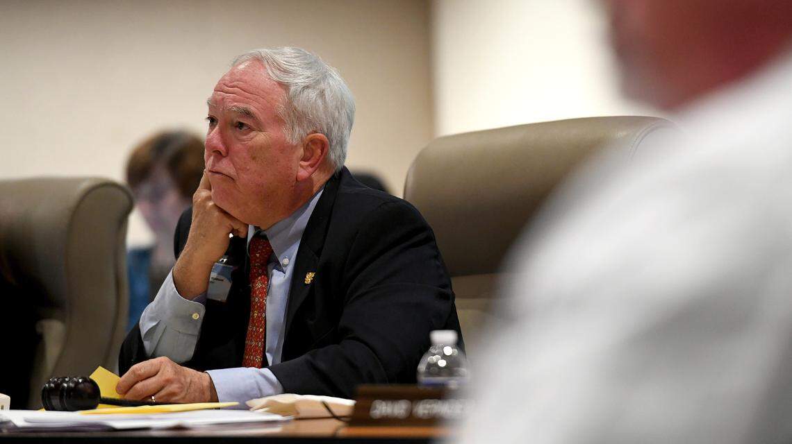 Board chair Tramm Hudson listens Monday as dozens of “medical freedom” activists attended a public board meeting at Sarasota Memorial Hospital, criticizing the hospital’s response to the COVID-19 pandemic and suggested alternative methods.