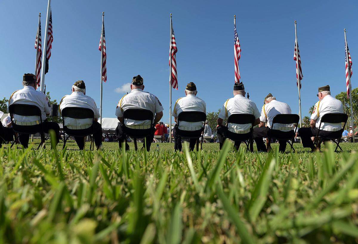 Members of the VFW Post 10141 sit at the Memorial Day 2016 service held at the Veteran’s Monument in Bradenton.