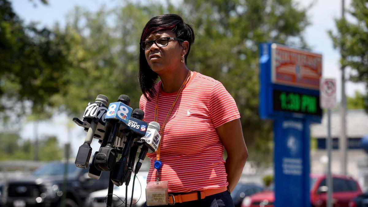 Southeast High principal Rosa Faison is emotional as she talks about two grads who died in an accident in Peru.