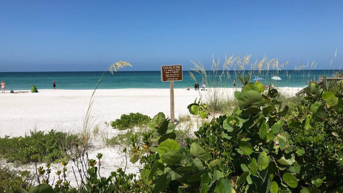 Views like this on Anna Maria Island keep visitors returning year after year, and inspire some to try to buy or build there.