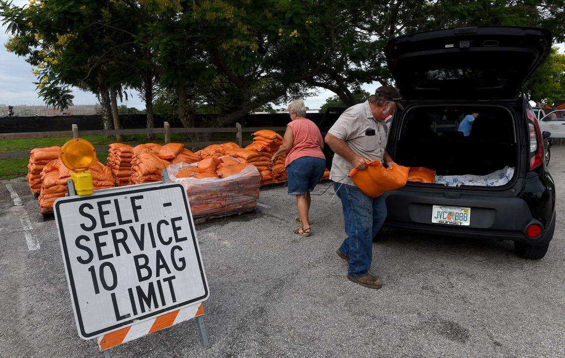 07/06/21—As Tropical Storm Elsa approaches, residents waited in line at G.T. Bray to get 10 sandbags apiece.
