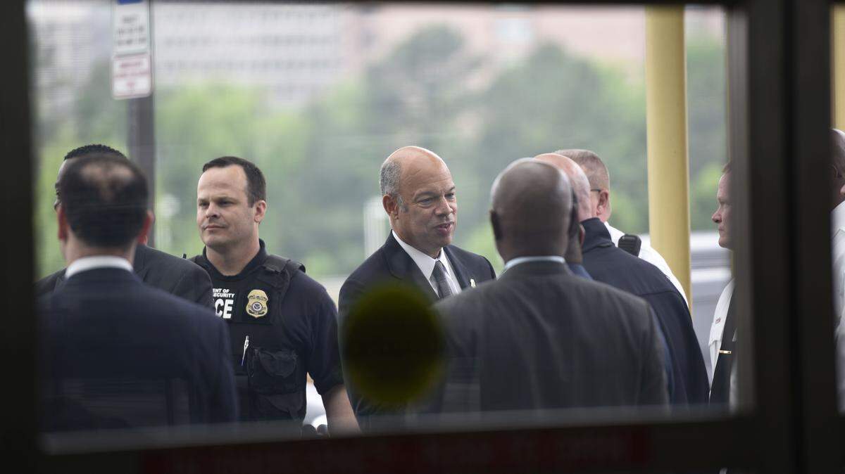 Homeland Security Secretary Jeh Johnson leaves after a news conference on airport security, Friday, May 13, 2016, at Washington's Ronald Reagan National Airport. Fliers across the country have been facing growing lines, which during peak hours have topped 90 minutes at some airports. The TSA has fewer screeners and has tightened security procedures. Meanwhile, more people are flying. (AP Photo/Sait Serkan Gurbuz)