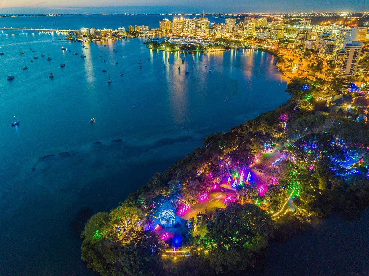 Marie Selby Botanical Garden’s “Lights in Bloom” returns to the Sarasota bayfront with more than two million lights illuminating the night from Dec. 6, 2025, to Jan. 3, 2026. 