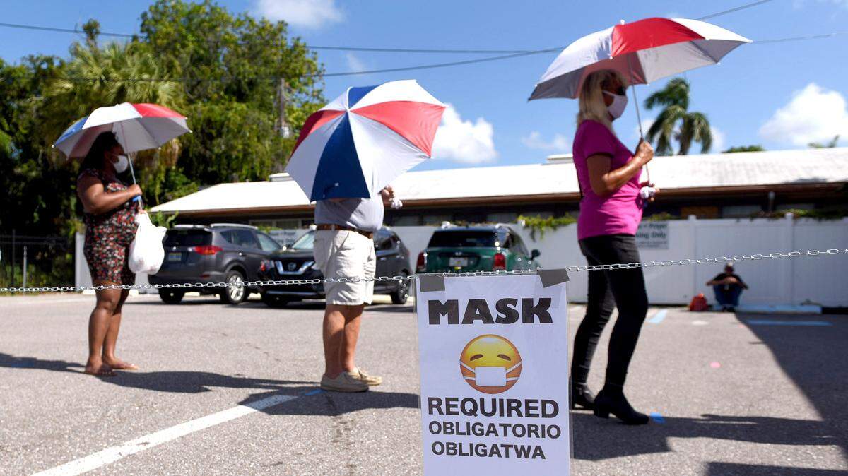 7/17/20--After Gov. Ron DeSantis signed an executive order putting an end to emergency orders and mask mandates in Florida, Manatee County leaders are urging caution and safety. In this Bradenton Herald file photo, the Stillpoint Mission posted a sign requiring people to wear a mask.