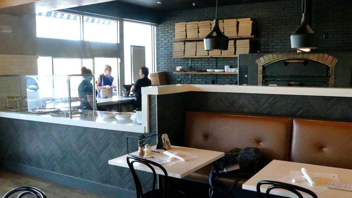 Customers have the option from ordering at a takeout window at the front of Vacci Pizza & Cucina, 4406 53rd Ave. E., Bradenton.