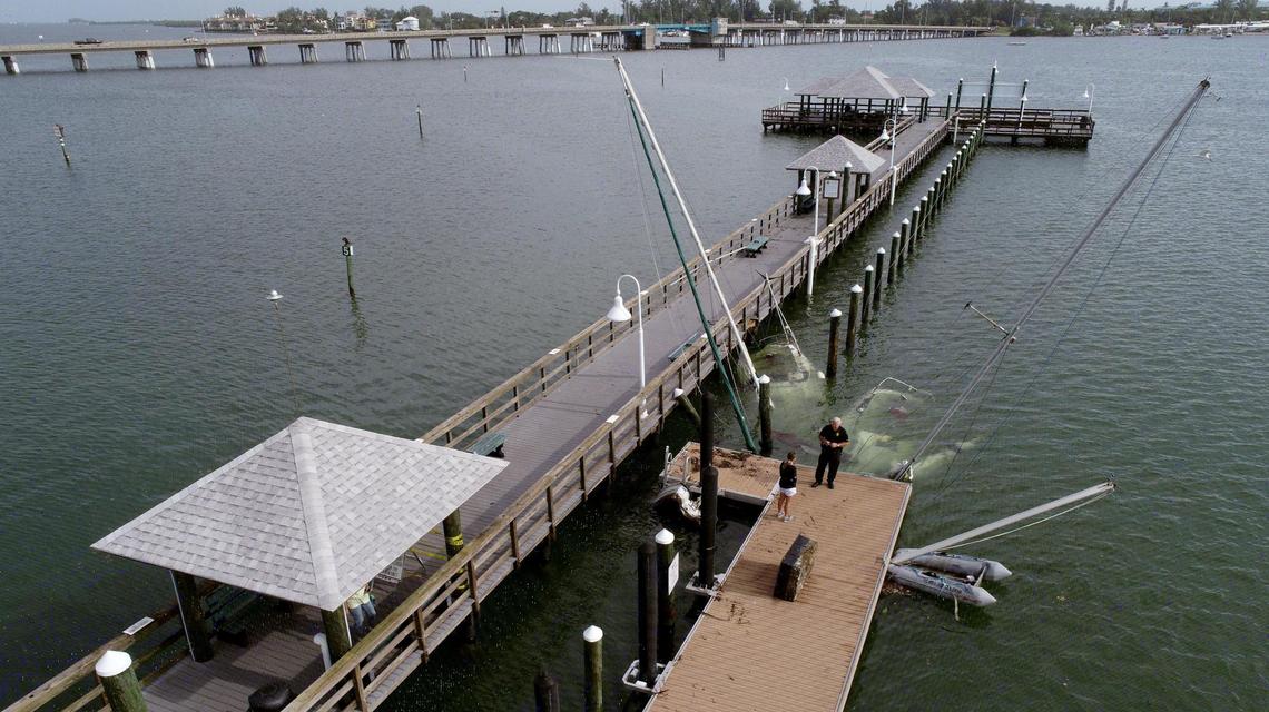 11/12/20--Several boats were partially sunk and damaged, resting near the Bridge Street Pier in the aftermath of Tropical Storm Eta.
