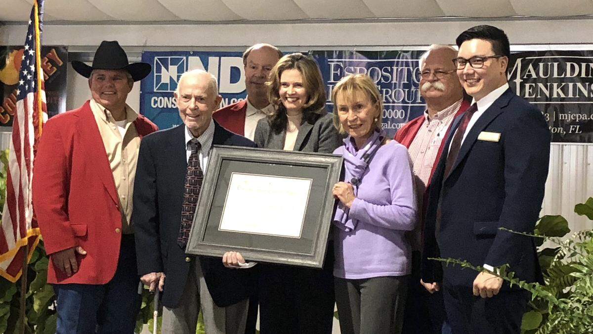 Retired judge Tom Gallen has been named the Manatee River Fair Association’s Distinguished Citizen. Shown above, from left, are fair manager Danny Alfonso, Judge Gallen, Jon Neuhauser, Janelle Esposito, Linda Gallen, Gerry Wolfe, and Phillip Saul.