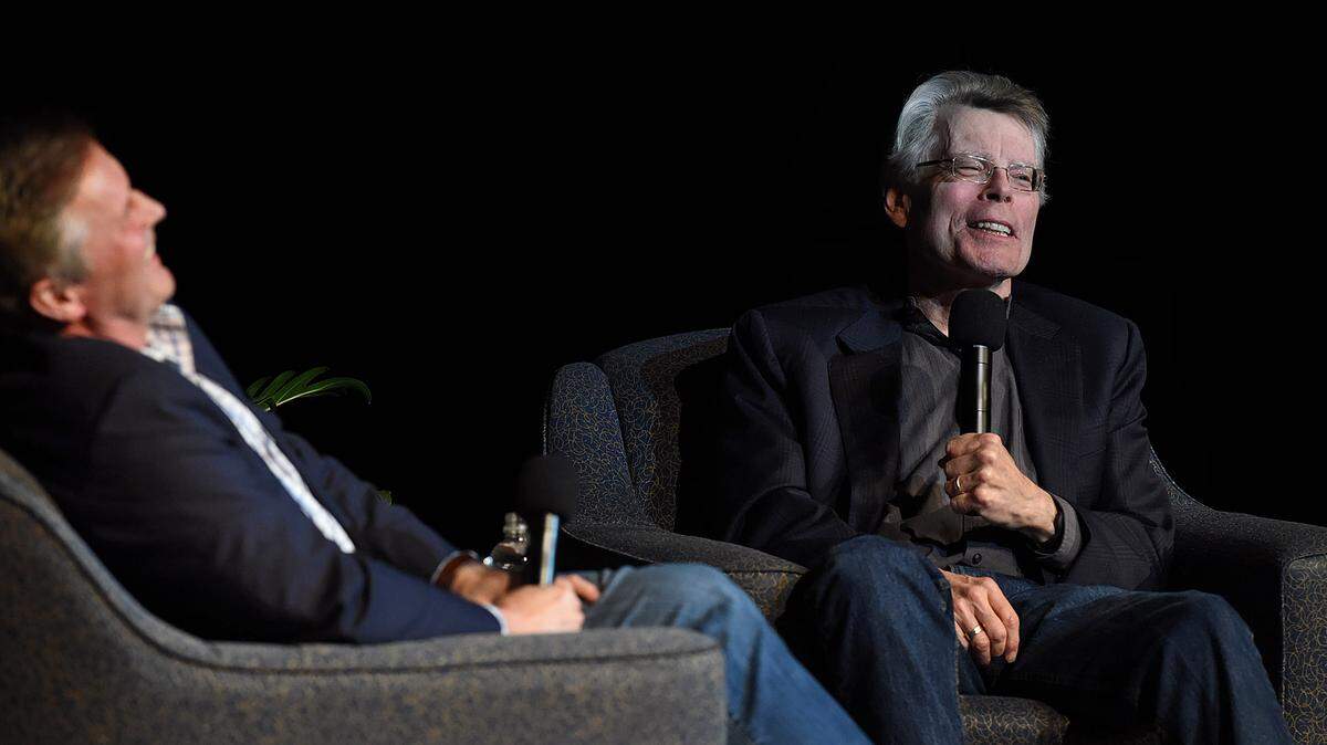 Authors John Grisham and Stephen King swap stories on stage at Neel Performing Arts Center at State College of Florida Tuesday night as a fundraiser for the Manatee Library Foundation. 
 TIFFANY TOMPKINS-CONDIE/Bradenton Herald