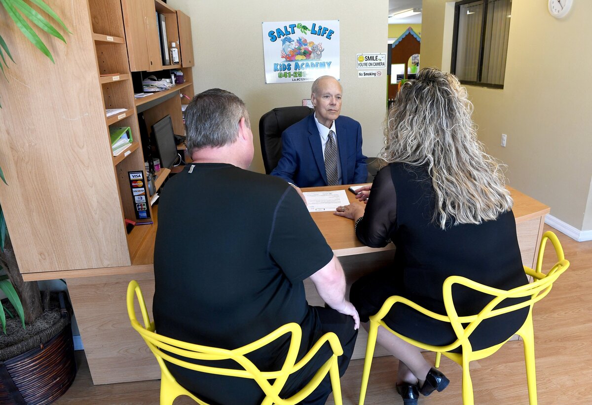 Daycare owners JoAnna and Steve Erickson with their attorney, James Patterson. The owners say they are suing the Manatee County Sheriff’s Office and Child Protective Services over the closing of their business in 2017.