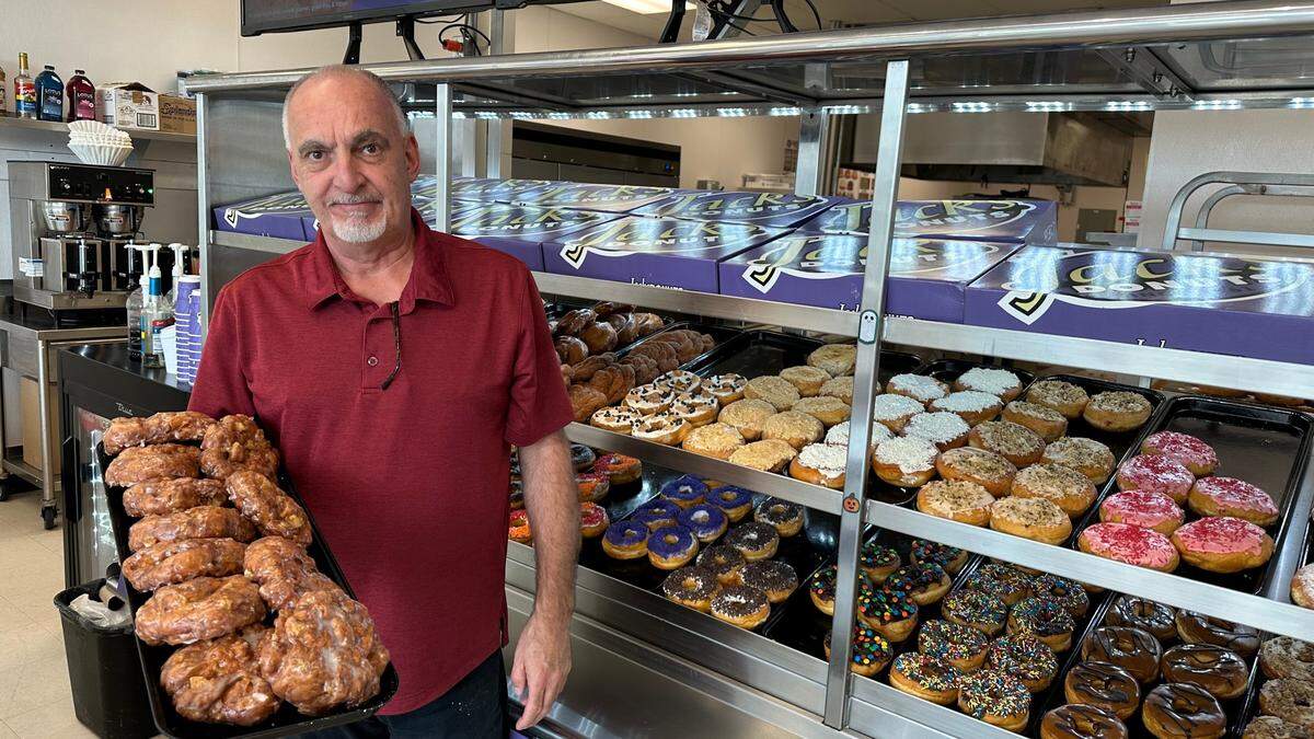 Jack’s Donuts, which started as a single pastry shop in New Castle, Ind., in 1961, now has its first Bradenton franchise at 6571 State Road 70 E. David Robins is shown with a tray of the shop’s popular apple fritters.